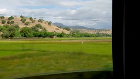 Rural-farming-countryside-landscape-view-of-crop-fields-and-rice-paddies-in-the-districts-of-Timor-Leste,-Southeast-Asia,-passing-views-from-car-window