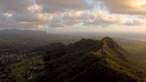 "Sleeping-Giant"-hill-in-Kauai,-Hawaii,-Cinematic-aerial-view-over-beautiful-mountains-in-Hawaii,-showing-the-stunning-green-nature