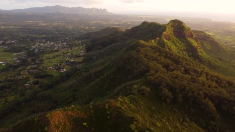 "Sleeping-Giant"-hill-in-Kauai,-Hawaii,-Cinematic-aerial-view-over-beautiful-mountains-in-Hawaii,-showing-the-stunning-green-nature