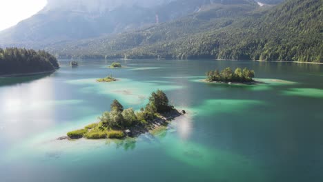 Aerial-alpine-lake-view-with-small-island-that-looks-like-caribbean