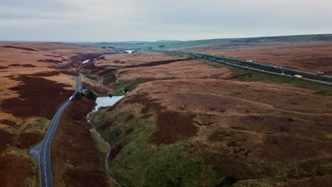 Aerial-timelapse-hyper-lapse-motion-lapse-footage-of-the-M62-motorway-at-Saddleworth-Moor-in-the-United-Kingdom