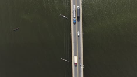 Fishing-boats-using-nets-under-the-highway-bridge
