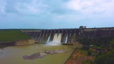 Aerial-Drone-shot-of-Water-flowing-from-open-gates-of-Dam-at-Madikheda-dam-,-Shivpuri,-Madhya-Pradesh