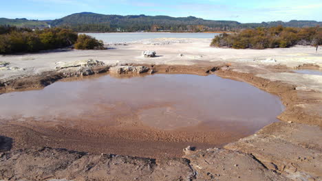Sulfur-Point-drone-skimming-Mud-pools-and-Rotorua-sulfur-lake-in-New-Zealand