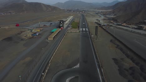 Racetrack-surrounded-by-mountains