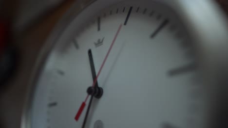 White-clock-ticking-showing-time-pass-by