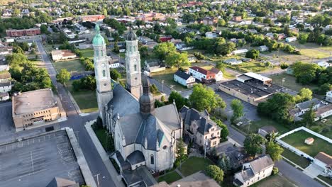 A-circling-aerial-view-of-the-Saint-Stanislaus-B-and-M-Roman-Catholic-Church-in-the-light-of-the-setting-sun