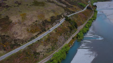 Drone-around-road-through-New-Zealand-Alps