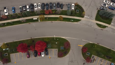 Top-down-aerial-view-of-city-street-with-car-parking-lot-in-Canada