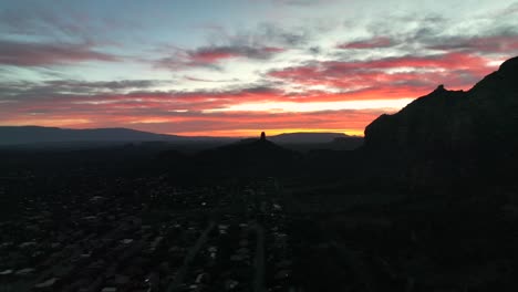 Red-Sunset-Sky-Over-Downtown-Silhouettes-Of-Sedona-In-Arizona