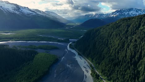 Aerial-View-Of-Resurrection-River-With-Panorama-Of-Dense-Forest-And-Mountains-In-Seward,-Alaska,-United-States