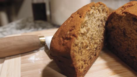 Close-Up-Fresh-Loaf-of-Sliced-Homemade-Banana-Bread-with-left-to-right-slide