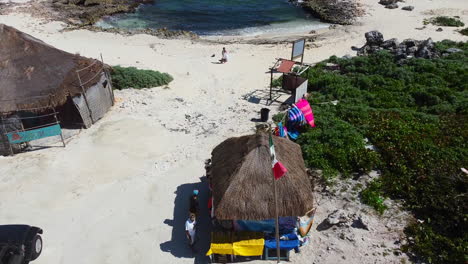 aerial-of-tourists-shopping-for-souvenirs-at-beachside-shops-in-Cozumel-Mexico