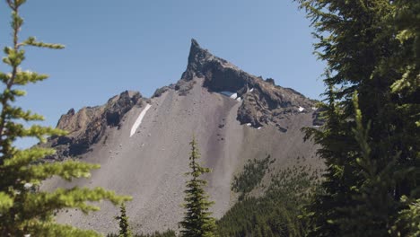 Pointed-mountain-with-trees-in-the-foreground