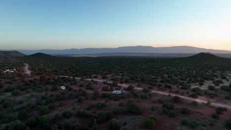 Camper-Van-On-The-Wild-Desert-Covered-With-Green-Bushes-Near-Sedona,-Arizona