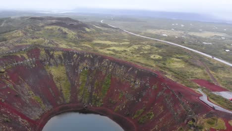 Aerial-of-Kerid-Crater-in-Iceland,-former-vulcano-that-is-now-a-lake