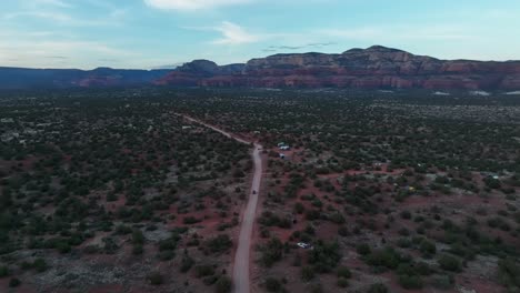 Panoramic-View-Of-A-Road-Surrounded-With-Green-Shrubs-Near-Sedona-Red-Rocks-In-Arizona