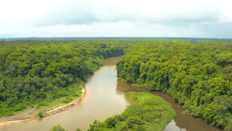 Stunning-raising-aerial-shot-of-Rupununi-river-in-the-jungles-of-Guyana