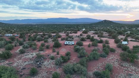 Camper-Vans-Parked-On-A-Semi-Desert-Grassland-In-Sedona,-Arizona,-USA
