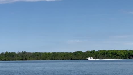 White-Speedboat-In-The-Blue-Sea-In-Summer---POV