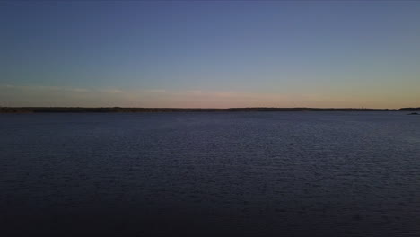 Drone-Shot-of-beautiful-Ocean-at-dusk