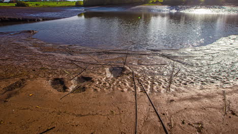 Timelapse-Of-Low-Tide-River-With-Tidal-Flats-During-Sunset