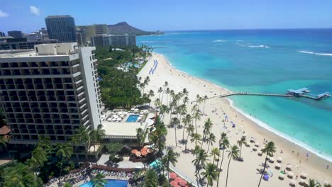 Looking-down-on-Waikiki-Beach-Honolulu-Hawaii,-from-balcony-of-Hilton-Hawaiian-Village-resort