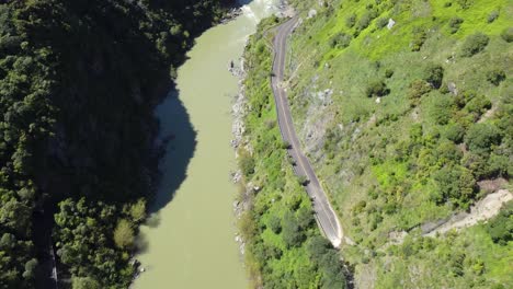 A-birdseye-flythrough-of-the-abandoned-Manawatu-Gorge-Road,-New-Zealand