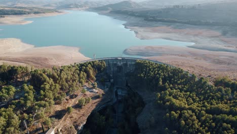Aerial-shot-away-of-Los-Bermejales-Swamp-and-Reservoir,-Granada,-Spain