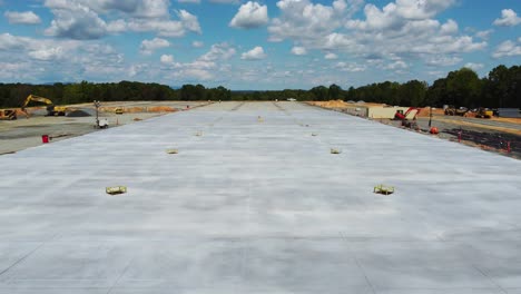 a-drone-showing-off-dried-concrete-along-with-a-vapor-barrier-where-concrete-will-be-poured