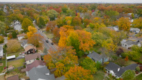 Aerial-of-Kirkwood-neighborhood-in-Autumn-with-pan-right-over-street-and-houses