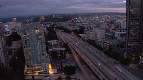Drone-shot-of-traffic-entering-Seattle's-busy-downtown-area