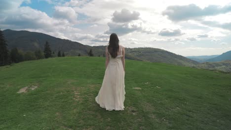 woman-in-a-dress-on-the-mountain