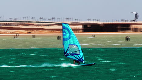 High-Speed-Windsurfer,-Windsurfing-in-Hurghada,-Egypt,-Water-Sport-on-unpolluted-beach,-Summer-day,-60-fps
