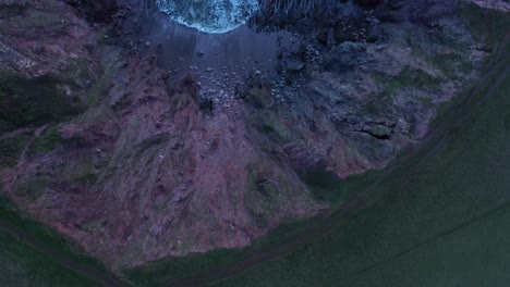 Last-Light-Top-down-footage-of-the-cliffs-and-sea-at-Challoborough-shot-by-drone