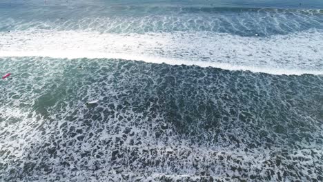 Aerial-Drone-of-the-ocean-waves-in-Kuta-Bali-4K