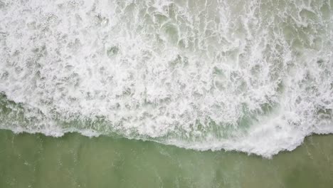 WAVES-CRASHING-ON-THE-SURF-AS-I-DECEND