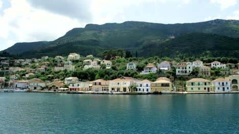 The-view-of-Vathy-village-in-Ithaca-as-seen-from-a-boat-in-Greece