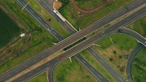 AERIAL:-crossroads-in-the-highway-with-cars