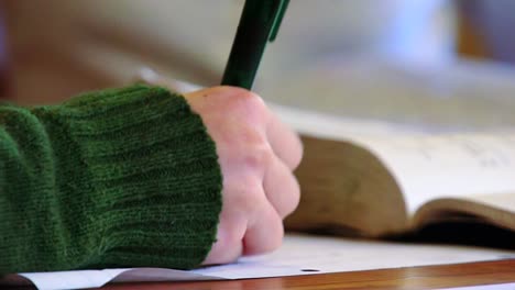 Student-Hand-Writing-Close-Up