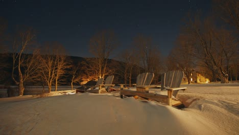 Time-Lapse-of-Stars-Over-Scenic-Chairs-Sitting-in-Snow