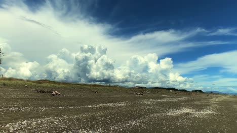 Timelapse-showing-interesting-cloud-movements,-patterns-and-swirling-motions-over-Otaki-Beach,-New-Zealand