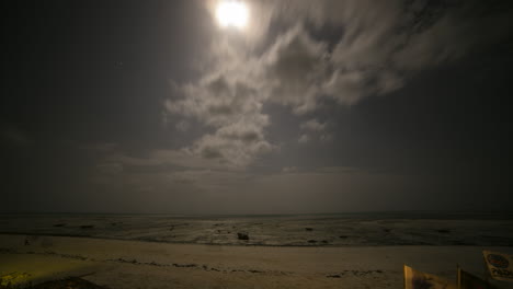 Starlapse-Big-Clouds-and-Moon-on-Windy-Evening-Tide-Way-Out-Jambiani-Tanzania
