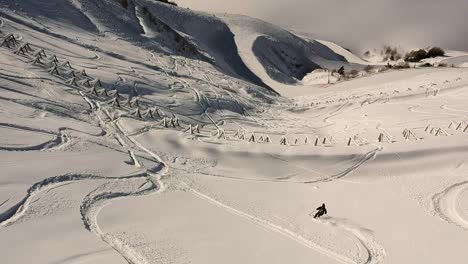 aerial-drone-view-of-a-skier-off-piste