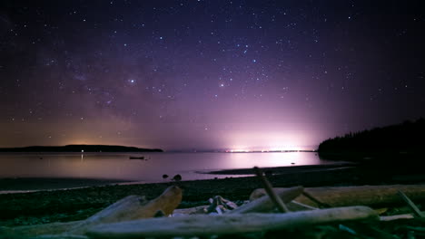 Starlapse-on-Beach-with-Milky-Way-and-Sunrise-along-with-the-tide-changing