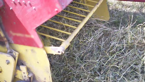 Farm-Machinery-Harvesting-Hay-Close-Up-Slow-Motion