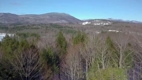 Rise-up-and-pan-right-revealing-Mt-Israel-and-the-White-Mountains-in-new-hampshire