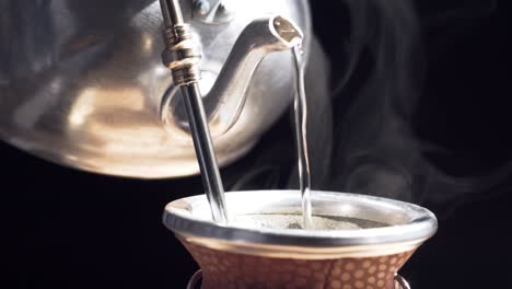 Pouring-water-to-make-argentine-green-tea