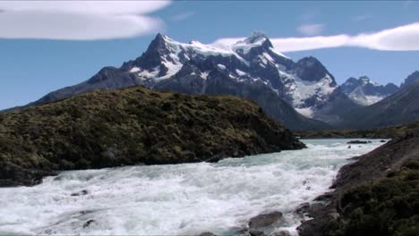 The-Paine-River-and-the-Cuernos-del-Paine-in-the-background-in-Patagonia,-Chile