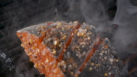 A-close-up-slow-motion-shot-from-the-top-of-salted-fish-being-smoked